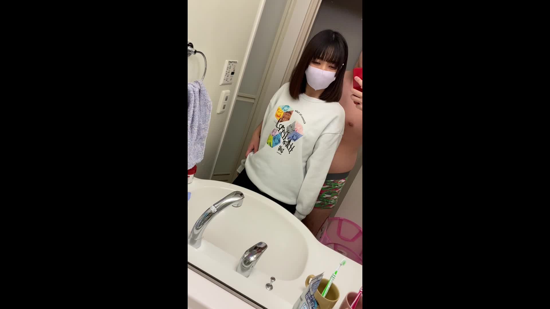 Asian babe giving a blowjob in the bathroom